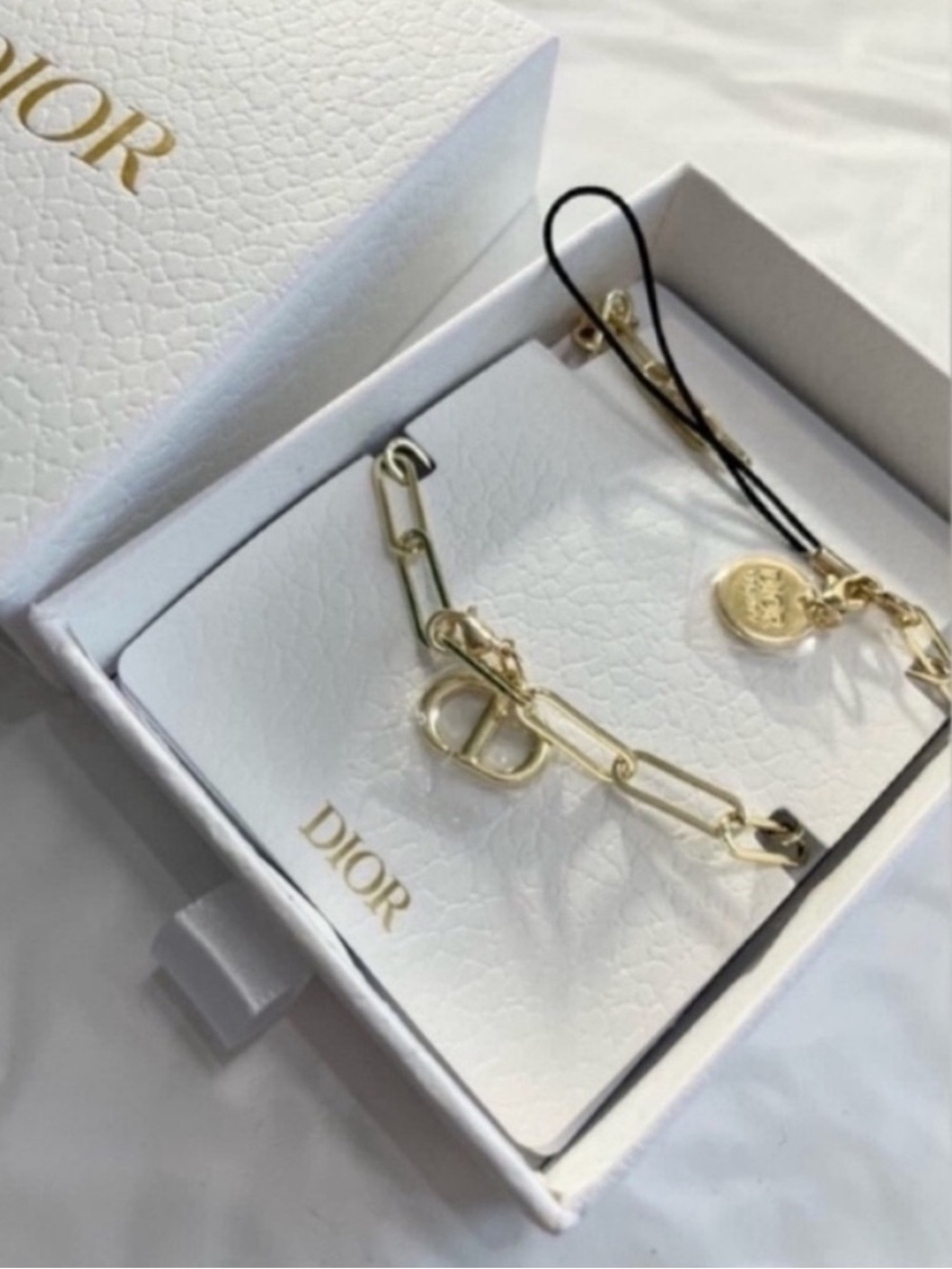 Dior beauty gift phone charm